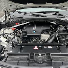 Mobile car detailing in Charlotte, NC: BMW X3 engine bay cleaned and dressed