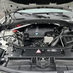 Premium mobile car detailing in Raleigh, NC: BMW X3 engine bay cleaned and dressed