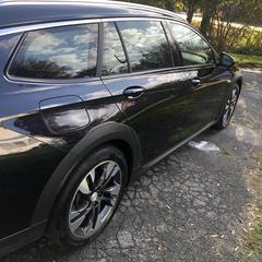 Mobile car detailing in Charlotte, NC: Black Buick Regal TourX with glossy, protected paint