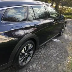 Premium mobile car detailing in Raleigh, NC: Black Buick Regal TourX with glossy, protected paint
