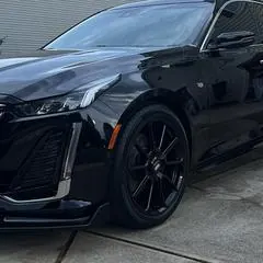 Premium mobile car detailing in Raleigh, NC: Black Cadillac CT5 with deep gloss after a ceramic coating