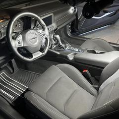 Mobile car detailing in Charlotte, NC: Chevy Camaro interior with clean seats and dash after a full interior detail