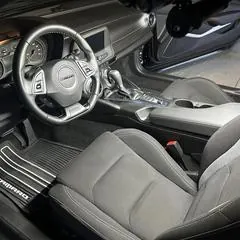 Premium mobile car detailing in Raleigh, NC: Chevy Camaro interior with clean seats and dash after a full interior detail