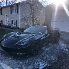 Premium mobile car detailing in Raleigh, NC: Black C7 Corvette Stingray with swirl-free, glossy paint