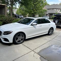 Mobile car detailing in Charlotte, NC: White Mercedes-Benz E-Class with clean, smooth paint