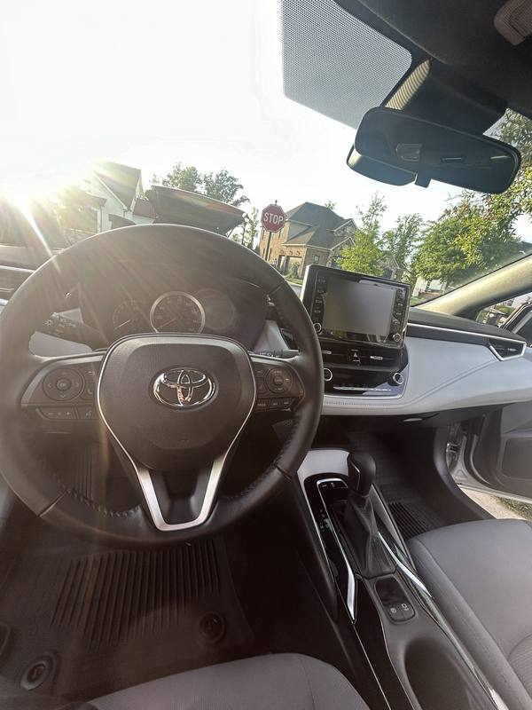 Mobile car detailing in Mooresville, NC: Toyota Corolla dashboard and gray interior after an interior detail
